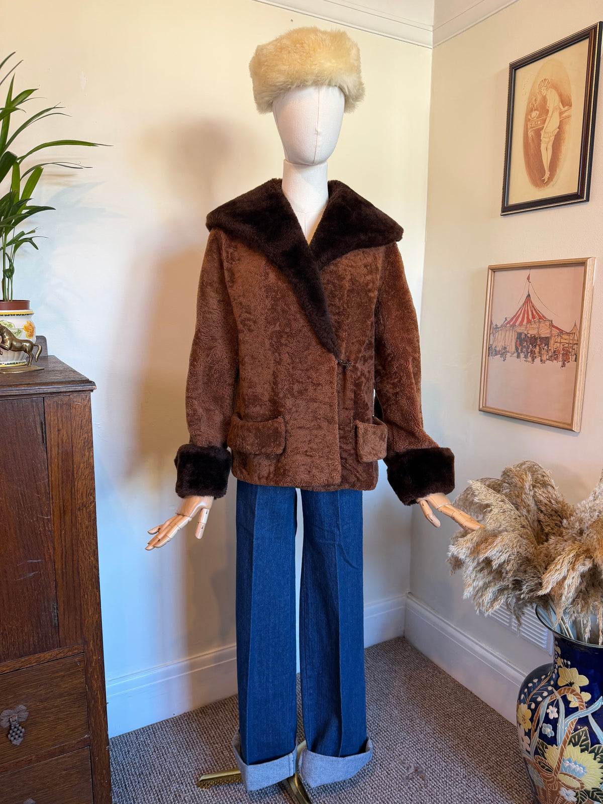 Vintage chocolate brown jacket with dark brown faux fur collar, cuffs and front trim, two patch pockets and burgundy lining.