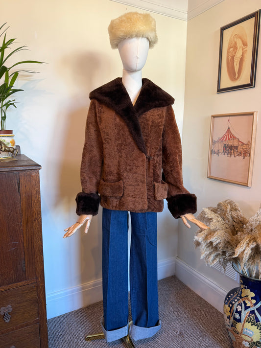 Vintage chocolate brown jacket with dark brown faux fur collar, cuffs and front trim, two patch pockets and burgundy lining.