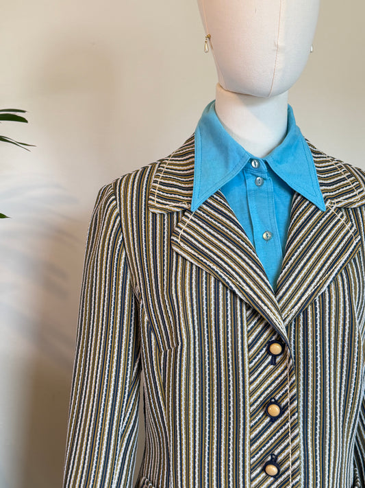 Vintage 1970s navy cream and mustard striped tailored blazer with oversized notched lapels, structured shoulders, patch pockets and chevron detailing.
