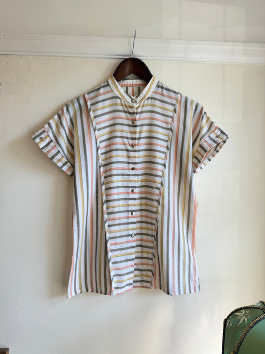 Vintage pastel striped blouse with a white base, dusty pink, mustard yellow and grey stripes, mandarin collar, front buttons and short buttoned sleeves.